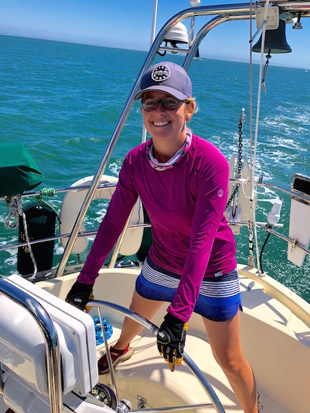 Me smiling at the helm.