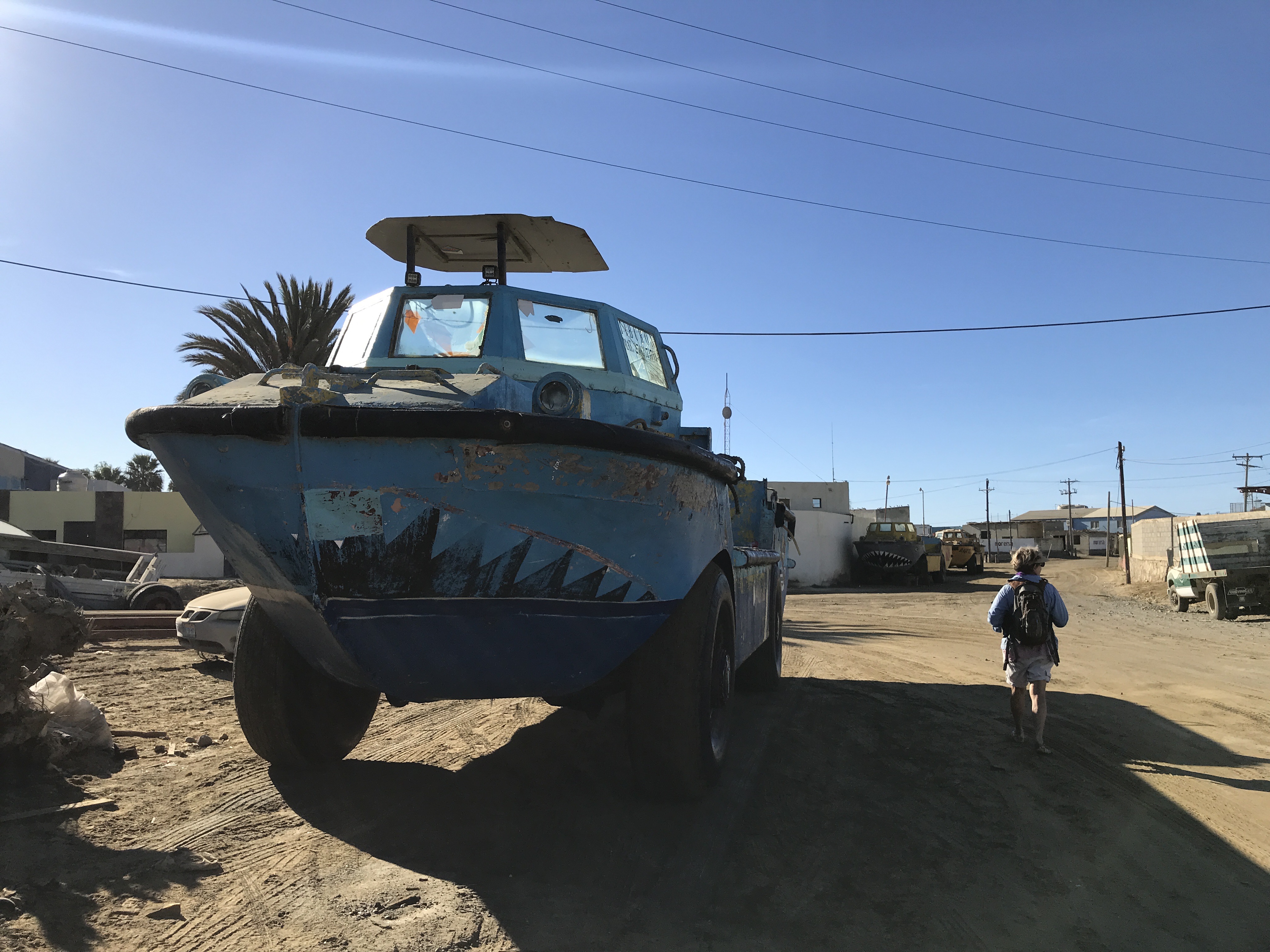 amphibious dive boat with shark teeth painted on the waterline